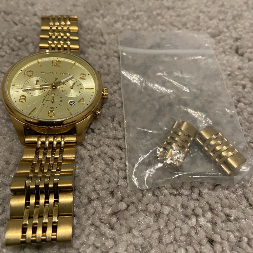 Michael Kors Mens Gold watch. Model mk-8638. Barely wore it. Needs a battery.